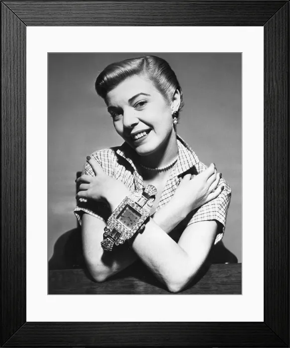 Framed Print : Woman Modeling Giant Wristwatch Framed Print : Woman Modeling Giant Wristwatch