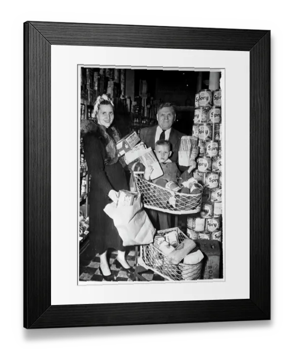 Framed Print : Family Buying Groceries Framed Print : Family Buying Groceries