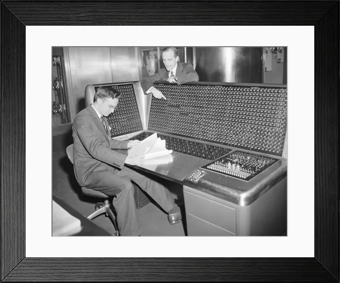 Framed Print : Man Works with Super Calculator to Split the Atom Framed Print : Man Works with Super Calculator to Split the Atom