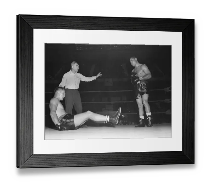 Framed Print : Boxer Goes Down in Match with Joe Louis