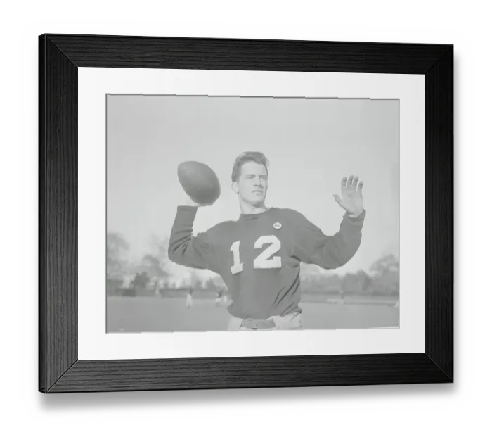 Framed Print : Dick Doheny Throwing Football