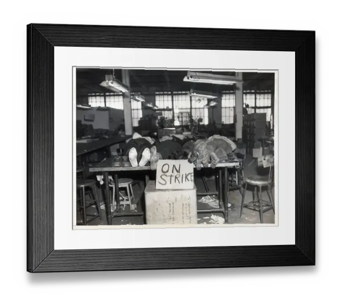 Framed Print : Striking Workers Lie On Table with Shoes Off Framed Print : Striking Workers Lie On Table with Shoes Off