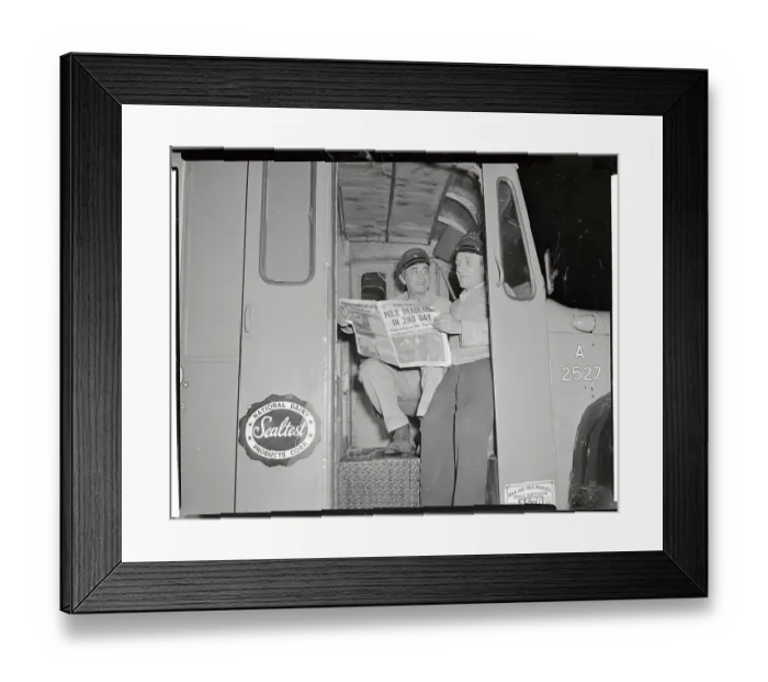 Framed Print : Workmen Reading Newspaper in Milk Truck Framed Print : Workmen Reading Newspaper in Milk Truck