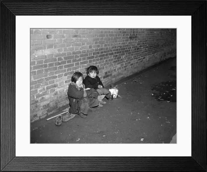 Framed Print : Children Huddled Against A Wall Framed Print : Children Huddled Against A Wall