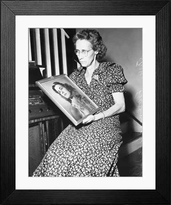 Framed Print : Mrs. Spangler Holds Portrait of Missing Daughter