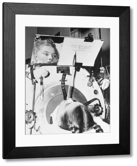 Framed Print : Paralysis Victim Writing with Her Teeth Framed Print : Paralysis Victim Writing with Her Teeth