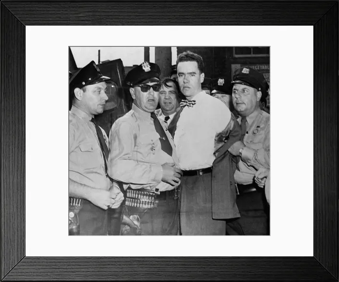 Framed Print : Suspect Being Guarded by Police Framed Print : Suspect Being Guarded by Police