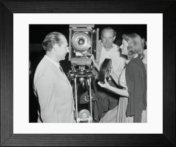 Framed Print : Ingrid Bergman Handing Reel to Roberto Rossellini Framed Print : Ingrid Bergman Handing Reel to Roberto Rossellini