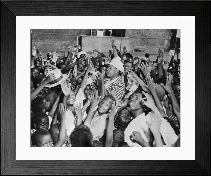 Framed Print : Joe Louis Handing out Tickets to Boys Framed Print : Joe Louis Handing out Tickets to Boys