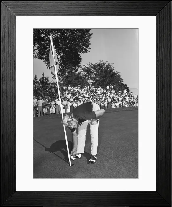 Framed Print : Sam Snead Bending Down to Retrieve Ball from Hole Framed Print : Sam Snead Bending Down to Retrieve Ball from Hole