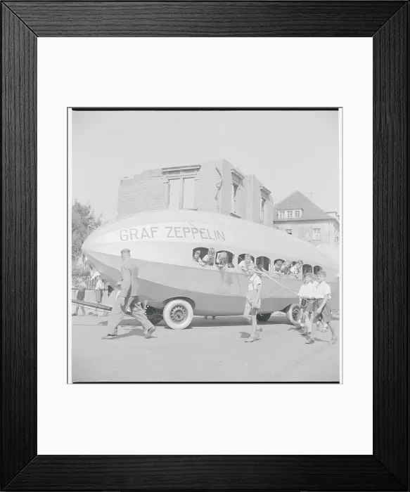 Framed Print : Seehasen Parade with Youngsters in and Towing Zeppelin Float Framed Print : Seehasen Parade with Youngsters in and Towing Zeppelin Float