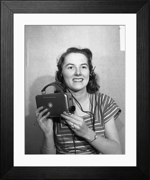 Framed Print : Woman Holding a Geiger Counter Framed Print : Woman Holding a Geiger Counter