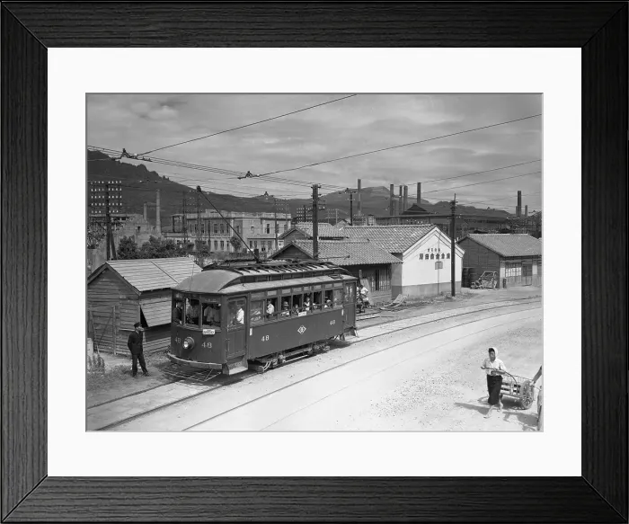 Framed Print : Passengers Riding in Trolley Car in Nagasaki Framed Print : Passengers Riding in Trolley Car in Nagasaki
