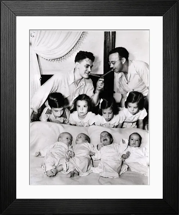 Framed Print : Men Light Cigars Above Quadruplets Framed Print : Men Light Cigars Above Quadruplets