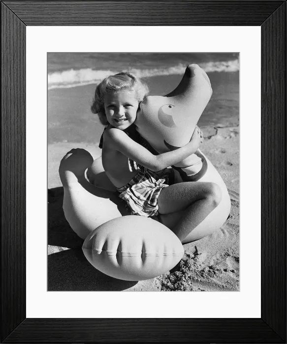 Framed Print : Girl Playing with Pool Toy Framed Print : Girl Playing with Pool Toy