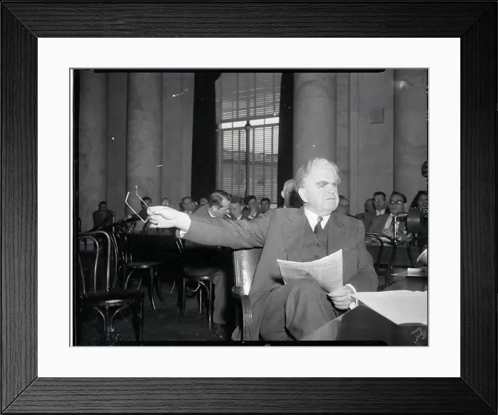 Framed Print : John Lewis Seated with Newspaper
