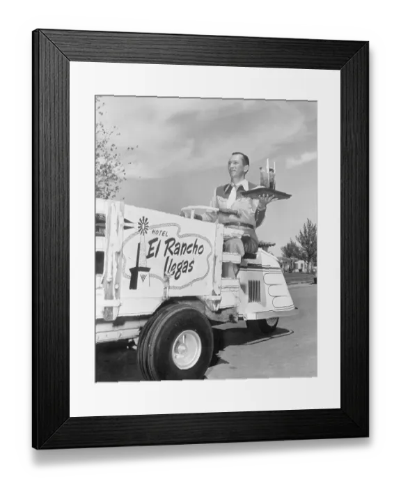 Framed Print : Bellhop Balancing Drinks
