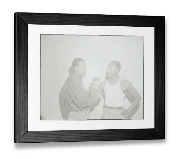 Framed Print : Boxing Champion Joe Louis Examining Muscle of Ezzard Charles Framed Print : Boxing Champion Joe Louis Examining Muscle of Ezzard Charles
