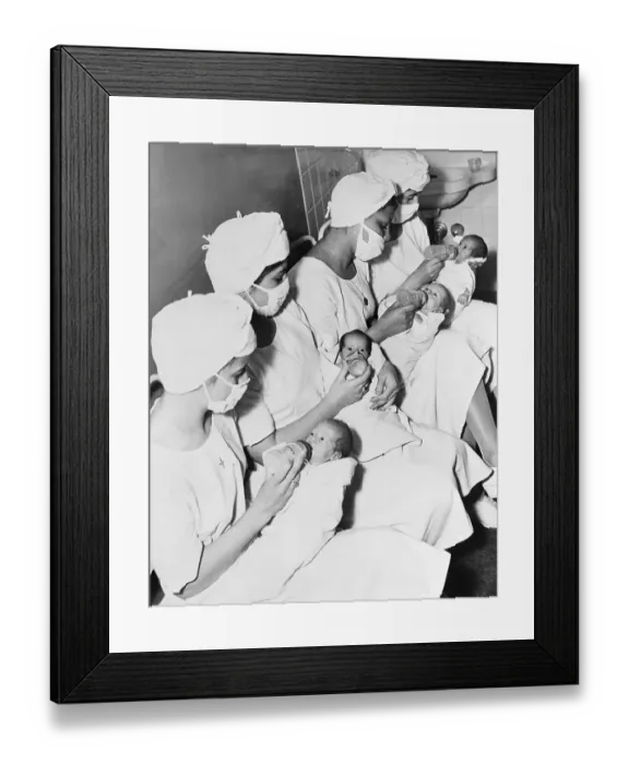 Framed Print : Nurses Feeding Quadruplets Framed Print : Nurses Feeding Quadruplets