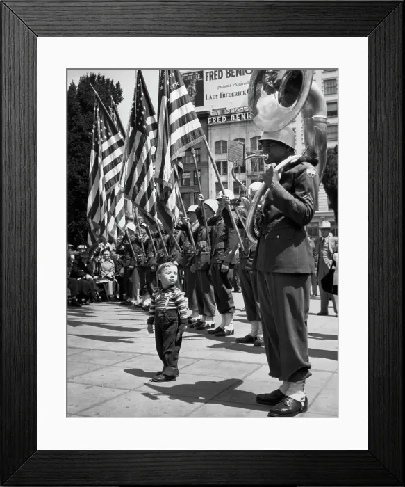 Framed Print : Boy Listening To Tuba Player