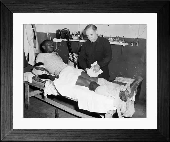 Framed Print : Satchel Paige With Ice Pack on His Leg