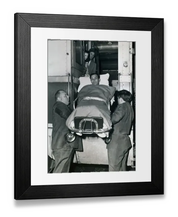 Framed Print : Ben Hogan Being Lifted on a Gurney