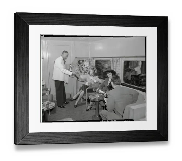 Framed Print : Young Women Being Served in Train Lounge Car Framed Print : Young Women Being Served in Train Lounge Car