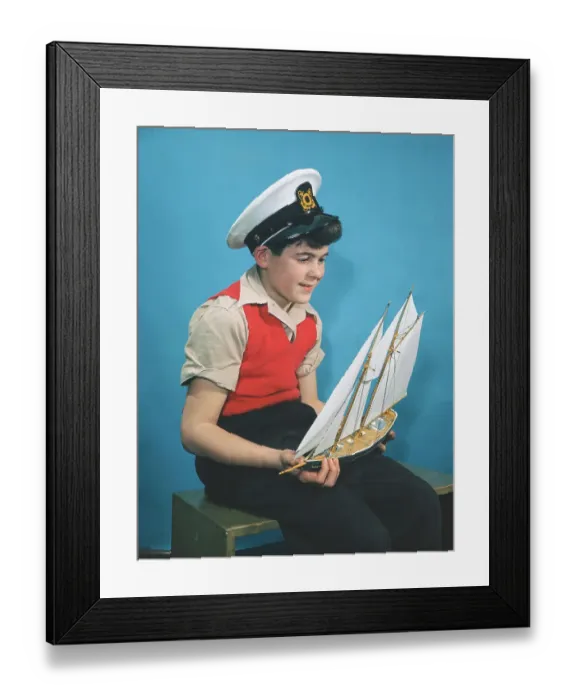 Framed Print : Boy Holding Model Sailboat Framed Print : Boy Holding Model Sailboat