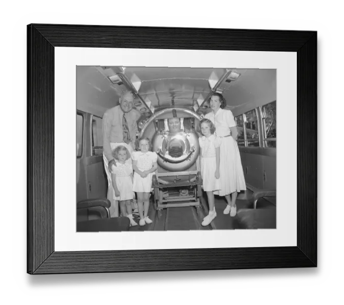 Framed Print : Man in Iron Lung Surrounded by Family Framed Print : Man in Iron Lung Surrounded by Family