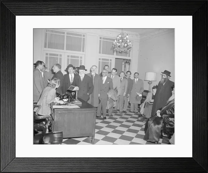Framed Print : Receptionist Attending To Line Of People Framed Print : Receptionist Attending To Line Of People