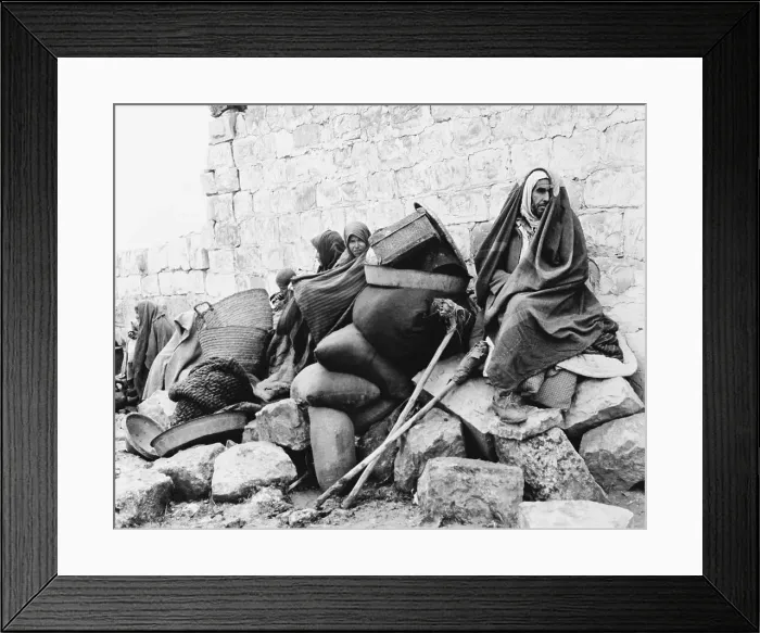 Framed Print : Crippled Civilian Seated on Stone Heap