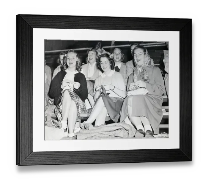 Framed Print : Women Seated in Stands Knitting Framed Print : Women Seated in Stands Knitting