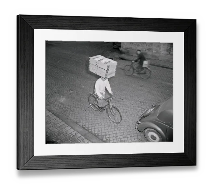 Framed Print : Delivery Boy Riding Bicycle with Box on Head Framed Print : Delivery Boy Riding Bicycle with Box on Head