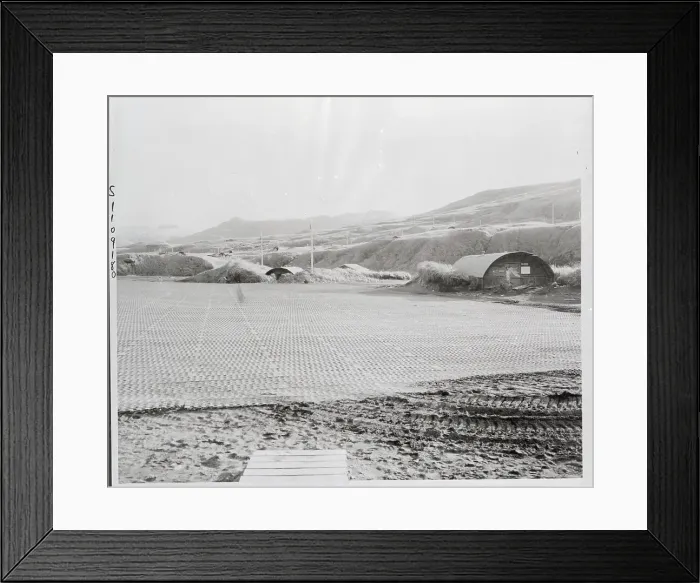 Framed Print : Deserted. Steel matting runways of this advanced Alaskan Airfield stretch emptily Framed Print : Deserted. Steel matting runways of this advanced Alaskan Airfield stretch emptily
