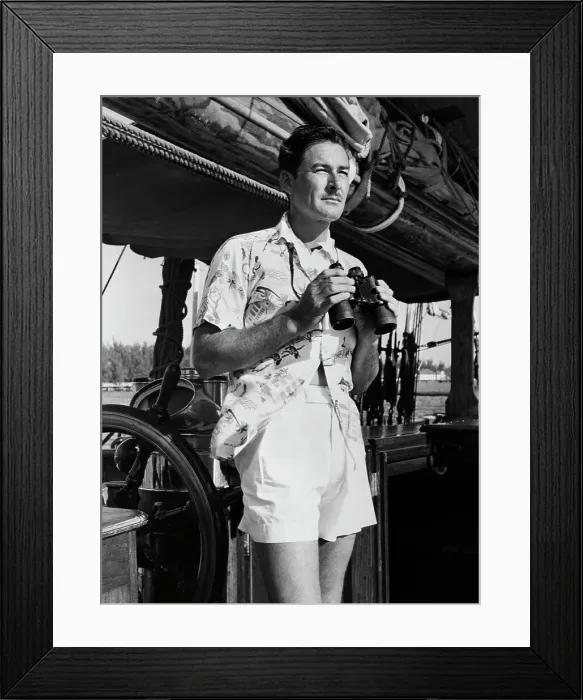 Framed Print : Errol Flynn with Binoculars Aboard His Yacht Framed Print : Errol Flynn with Binoculars Aboard His Yacht