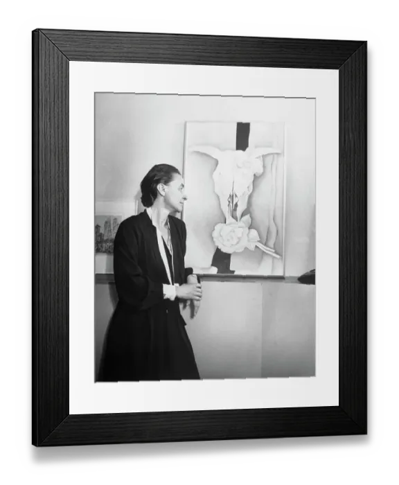 Framed Print : Georgia O'Keeffe Looking at Her Painting of Bleached Bones and Flowers