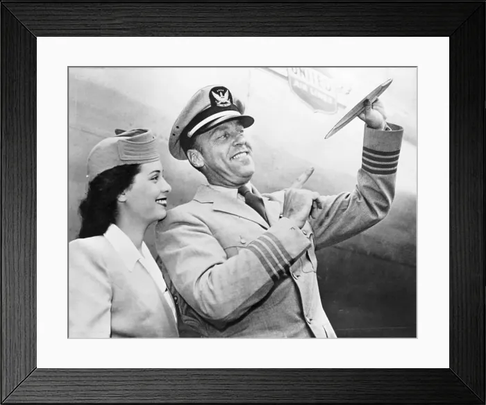 Framed Print : Capt. E. J. Smith & Stewardess Smiling Framed Print : Capt. E. J. Smith & Stewardess Smiling
