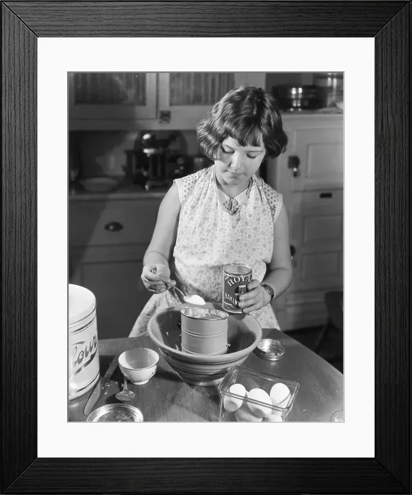 Framed Print : Girl Mixing Food in Kitchen Framed Print : Girl Mixing Food in Kitchen