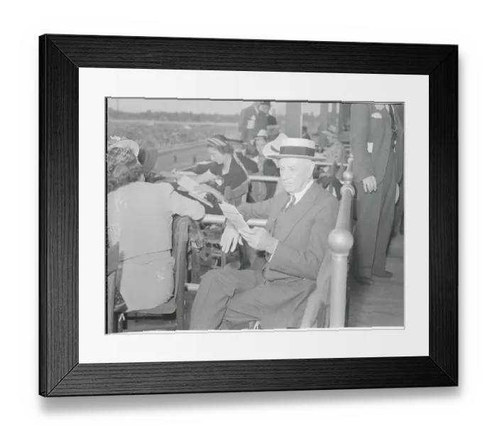 Framed Print : E.R. Bradley Reading Papers at Race Framed Print : E.R. Bradley Reading Papers at Race