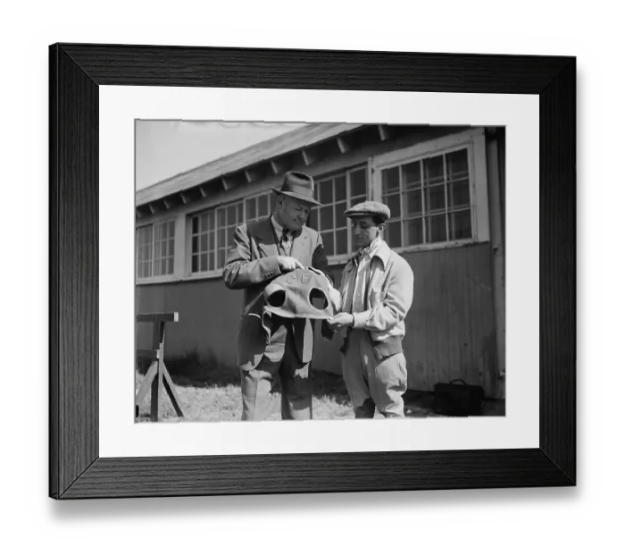 Framed Print : Ben Jones and Eddie Arcaro Examining Blinkers Framed Print : Ben Jones and Eddie Arcaro Examining Blinkers
