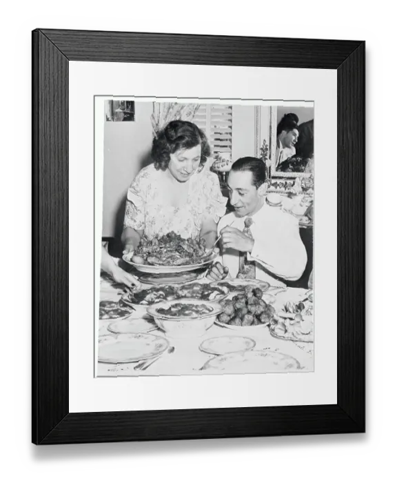 Framed Print : Eddie Arcaro Being Served Food by His Mother Framed Print : Eddie Arcaro Being Served Food by His Mother