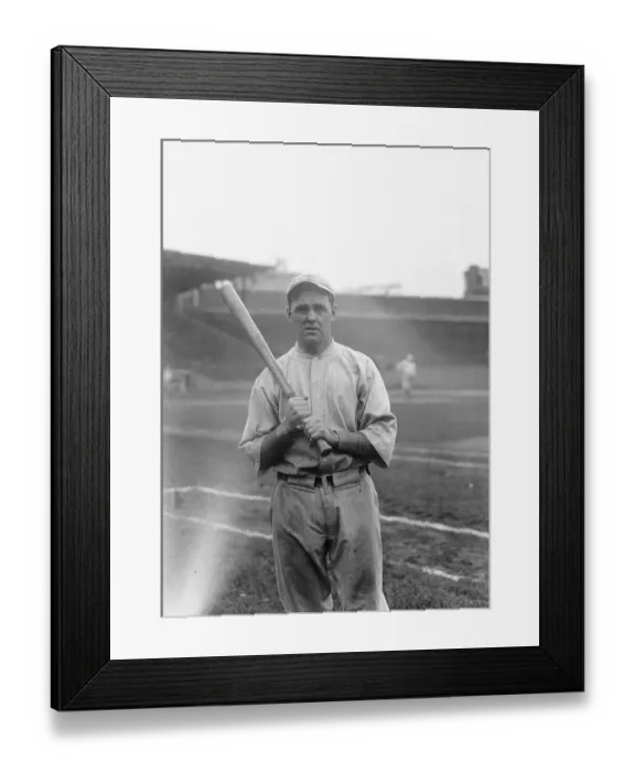 Framed Print : Baseball Player Holding Bat Framed Print : Baseball Player Holding Bat