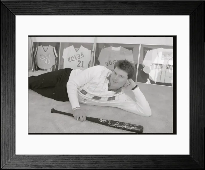 Framed Print : Roger Clemens Lying Next to His Baseball Memorabilia Framed Print : Roger Clemens Lying Next to His Baseball Memorabilia