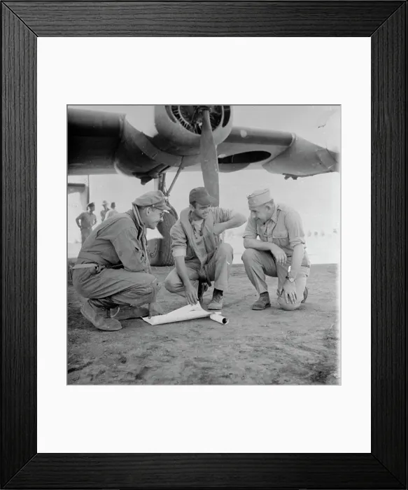 Framed Print : Military Men Going over Bombing Mission Near Aircraft