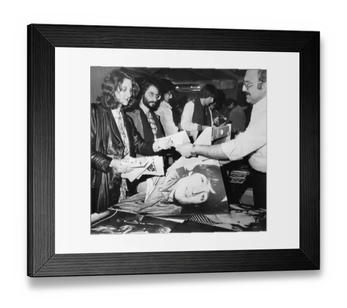 Framed Print : Fan Purchasing John Lennon Photo Framed Print : Fan Purchasing John Lennon Photo