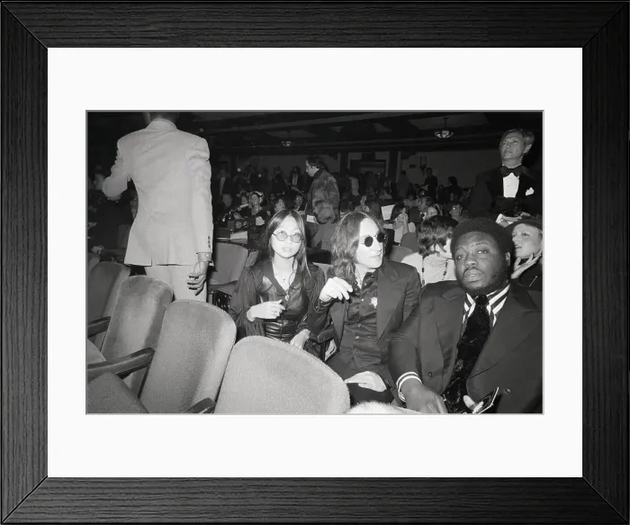 Framed Print : John Lennon and May Pang Seated in Theater Framed Print : John Lennon and May Pang Seated in Theater