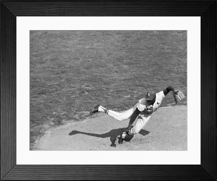Framed Print : B. Gibson Falls As He Follows Pitch Thru Framed Print : B. Gibson Falls As He Follows Pitch Thru