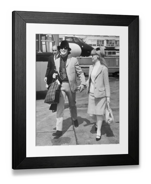 Framed Print : John and Cynthia Lennon At Airport Framed Print : John and Cynthia Lennon At Airport