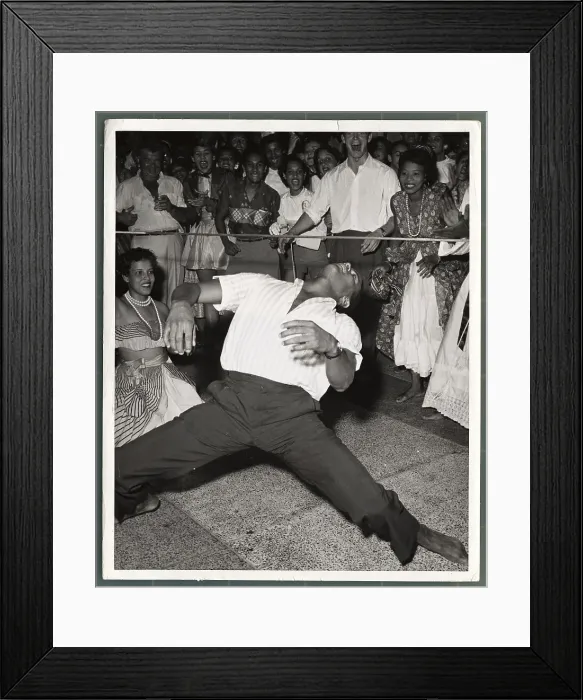 Framed Print : Man Dancing Under Limbo Stick Framed Print : Man Dancing Under Limbo Stick