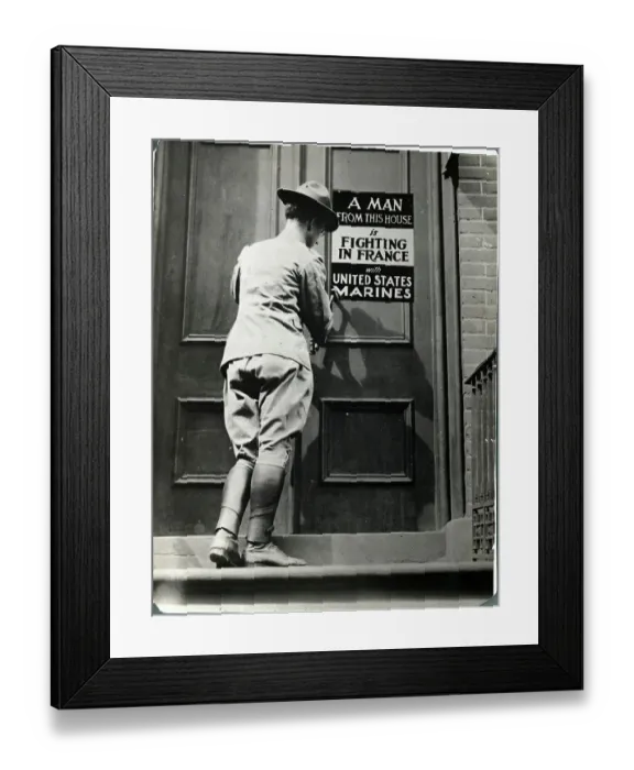 Framed Print : Marine Placing A Information Placeard Framed Print : Marine Placing A Information Placeard